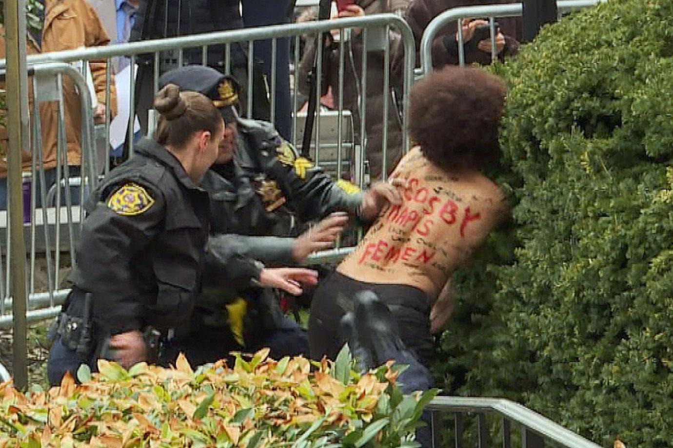 //Bill Cosby Topless Protestors Courthouse