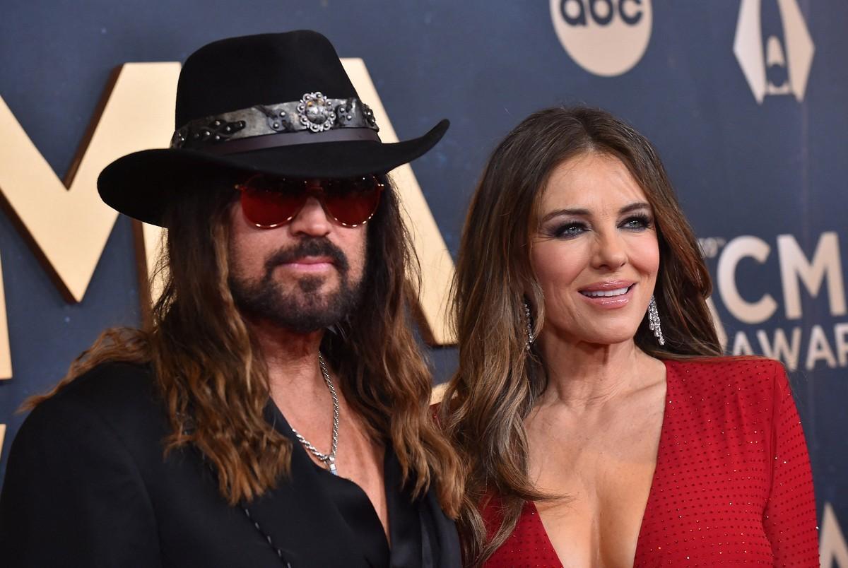 Miley reportedly gets along well with Hurley and supports her relationship with Billy Ray.