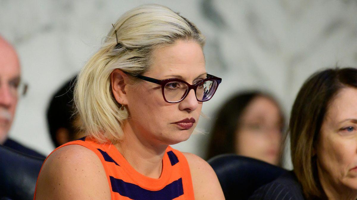 image of Sinema acknowledged the relationship became 'romantic and intimate' but disputed key allegations.