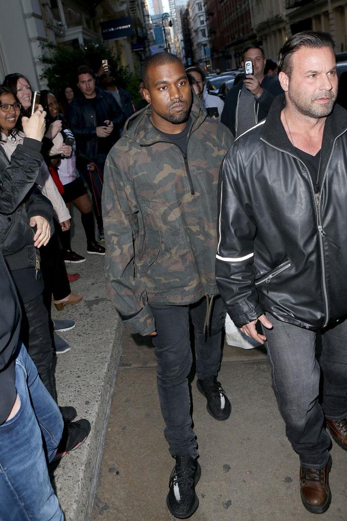 //kanye west fires bodyguard talking to wife kim kardashian