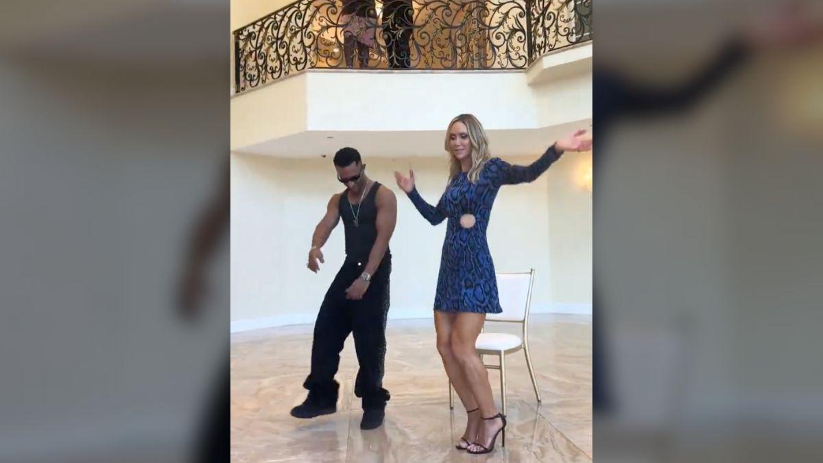 Image of Lara Trump dances with Mohamed Ramadan during a video shoot for their upcoming track.