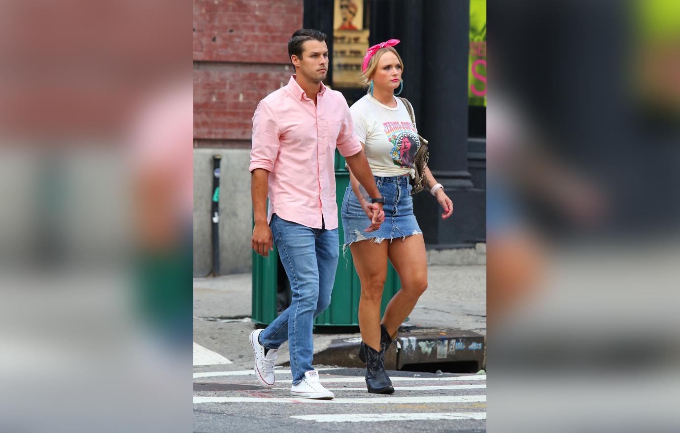 Miranda Lambert and Husband Brendan McLoughlin Seen Walking Holding Hands Outside In Matching Pink and Denim Outfits