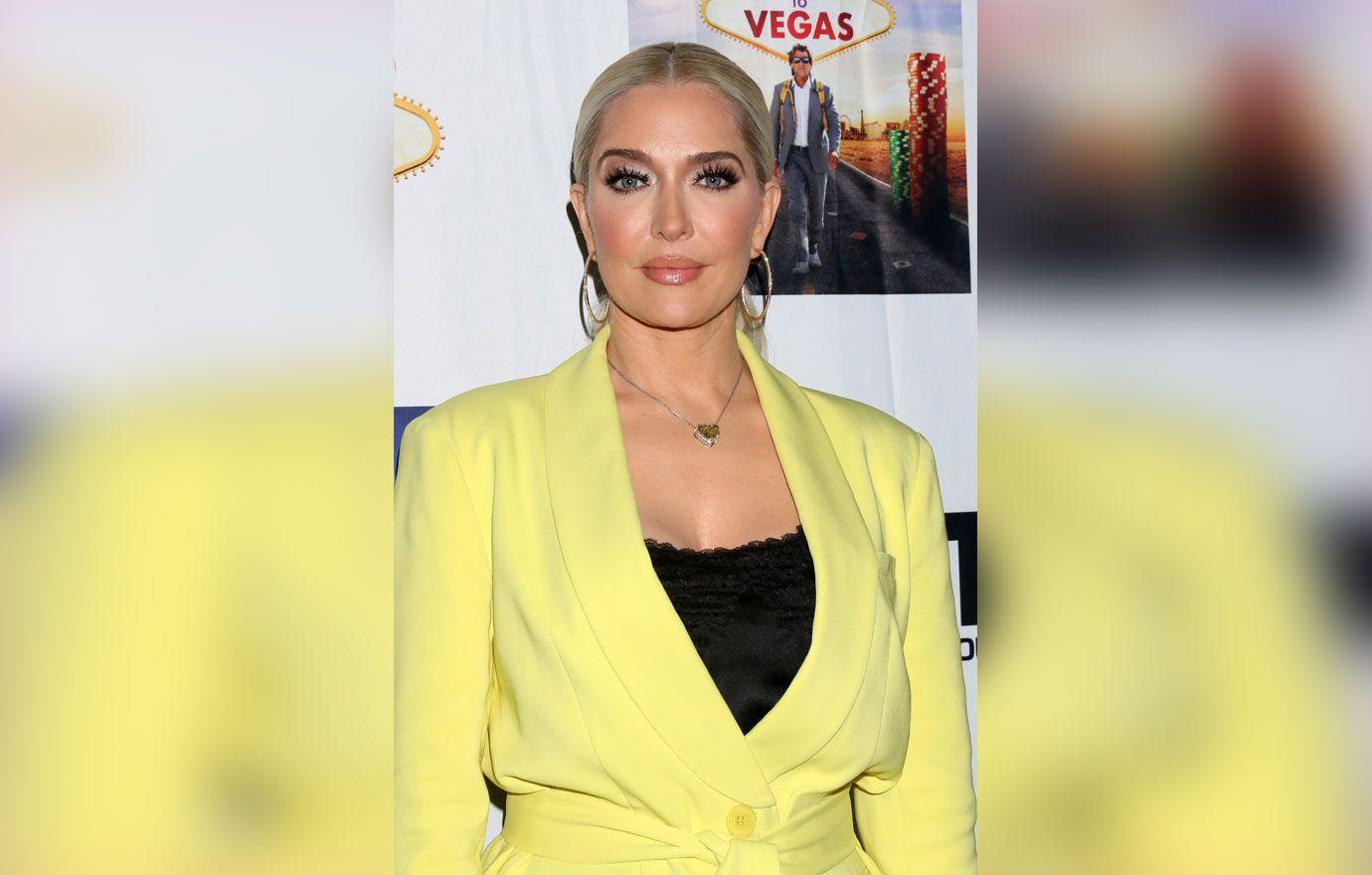 Erika Jayne lugs her own groceries amid financial woes