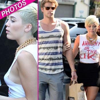 Miley Cyrus Shops Without a Bra, Flashes Side Boob!