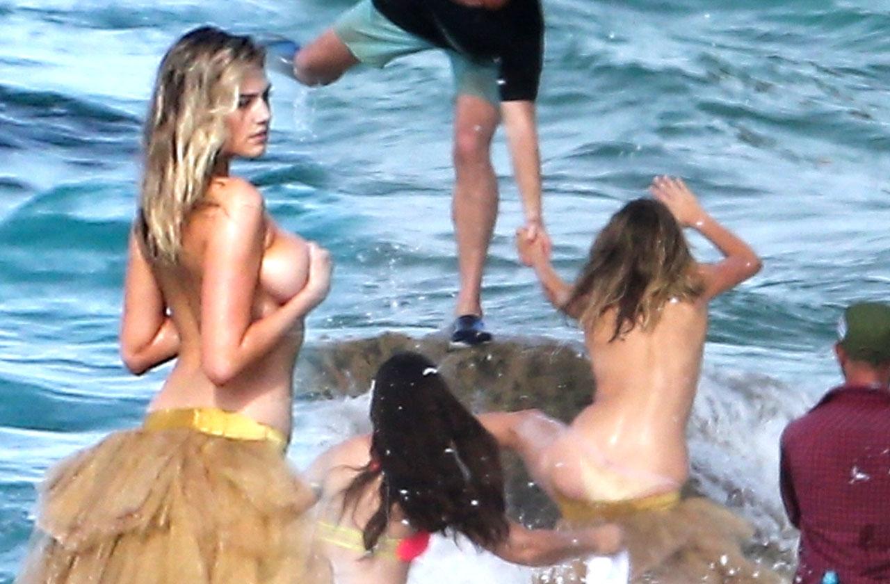 Kate Upton Hit By Wave Photo