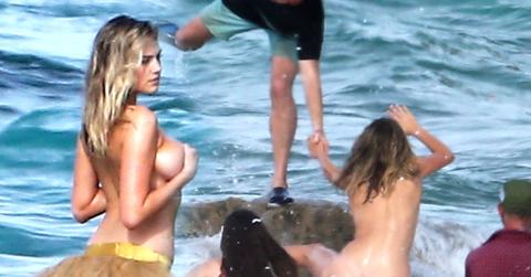 Kate Upton Hit By Wave Photo