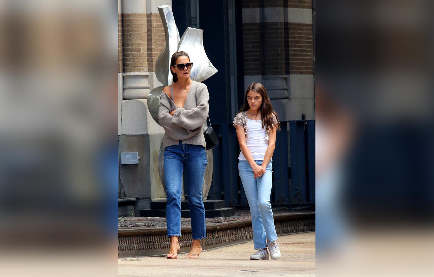 Katie Holmes Flaunts Cleavage in Loose Gray Sweater and Matching Bra Walking With Daughter Suri Cruise