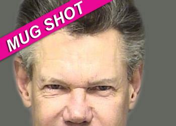 //randy travis mugshot public intoxication