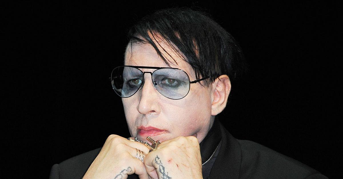 marilyn manson turns himself in police assault videographer jail r