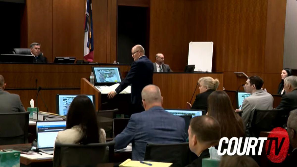 The hearing will determine if Tyler Robinson (gray jacket) will go to a formal trial.