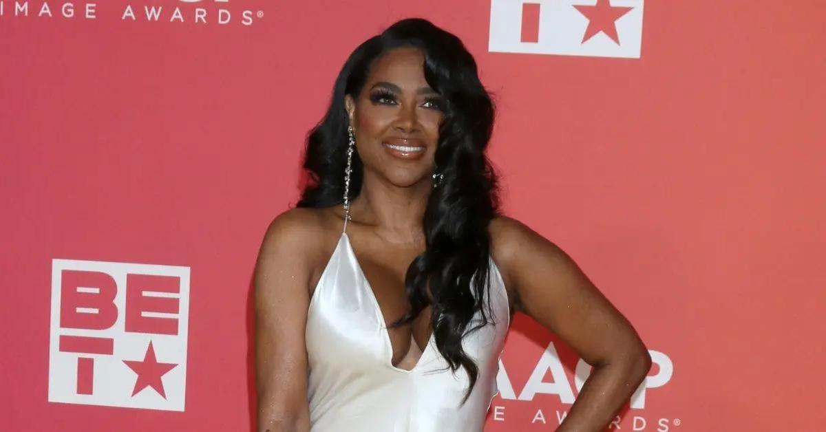 kenya moore not returning rhoa season  poster scandal