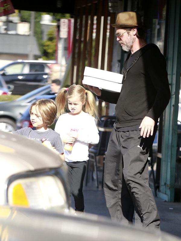 Brad Pitt Photos -- Actor Sports Black Eye Taking Out Twins Vivienne and Knox