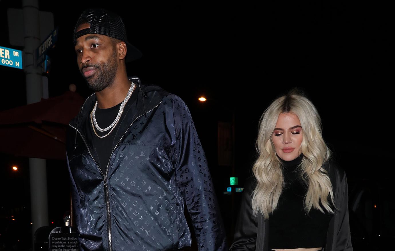 khloe kardashian not bothered tristan thompson holding hands mystery woman