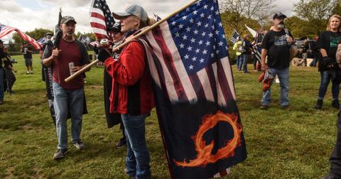 donald trump interrupted qanon conspiracy chants new hampshire rally