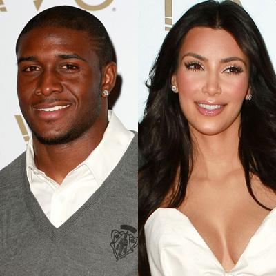 Super Bowl 2010: Kim Kardashian kisses Reggie Bush after New