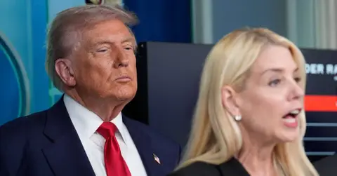 Photo of Donald Trump and Pam Bondi