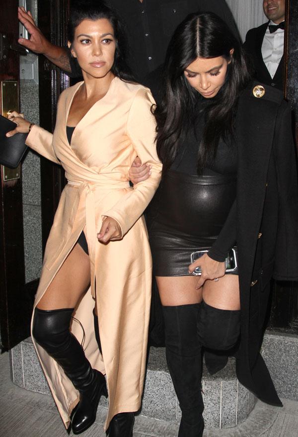 Oops Kourtney Kardashian Suffers Wardrobe Malfunction While Out With Kim During NYFW