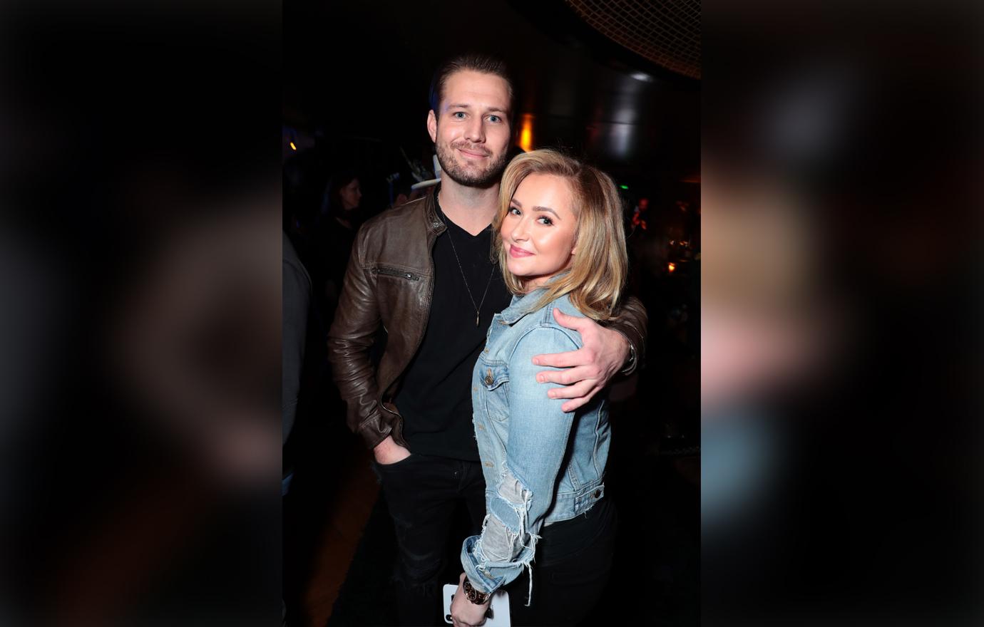 Hayden Panettiere Wears A Denim Jacket and Smiles as Boyfriend Brian Hickerson Has His Arm Around Her and Is Also Smiling and Wearing a Leather Jacket