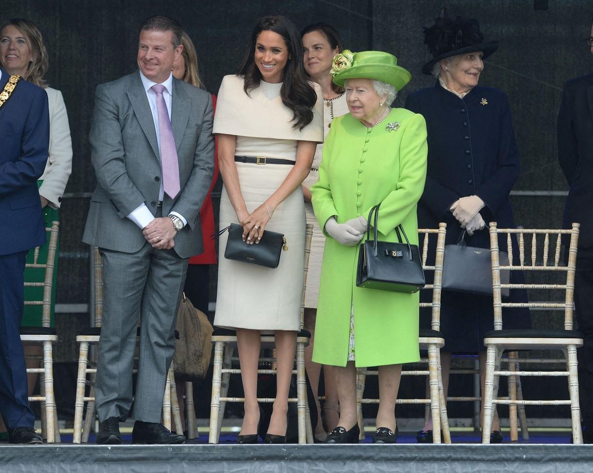 Robert Hardman's 'Elizabeth II: In Private. In Public. The Inside Story' says Queen Elizabeth was displeased with Meghan Markle's wedding choices.