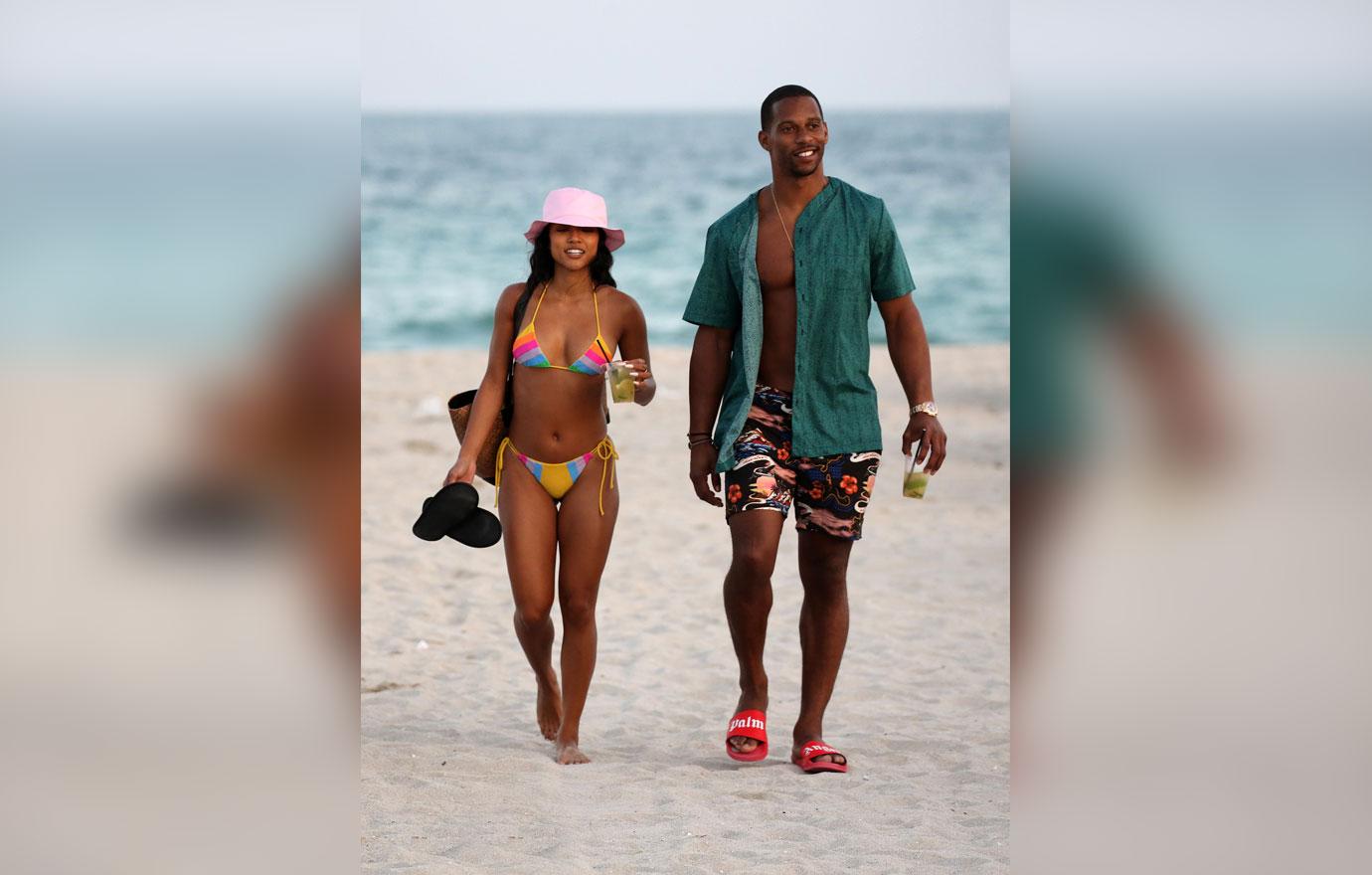 Victor Cruz & Karrueche Tran Spend New Year's Eve at the Beach: Photo  4203960, Bikini, Karrueche Tran, Shirtless, Victor Cruz Photos