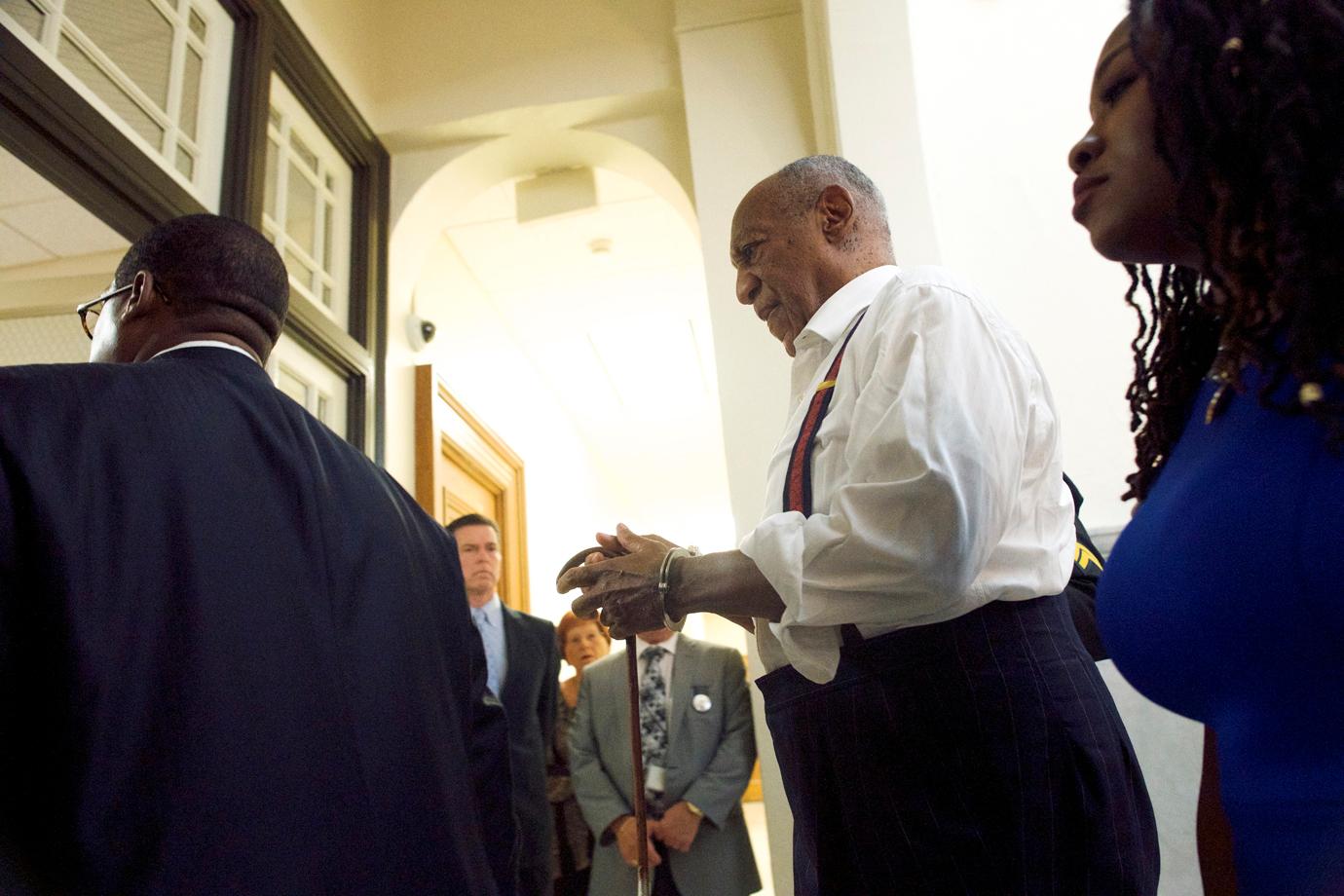 bill cosby handcuffed first photos no bail prison sentence