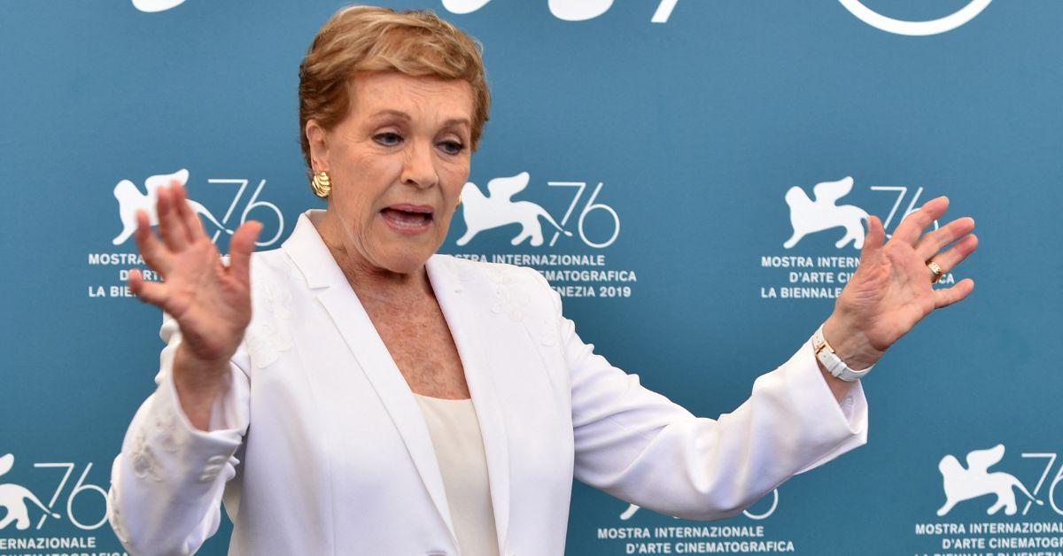 Julie Andrews was knocked flat by a helicopter downdraft during the film's iconic opening scene.