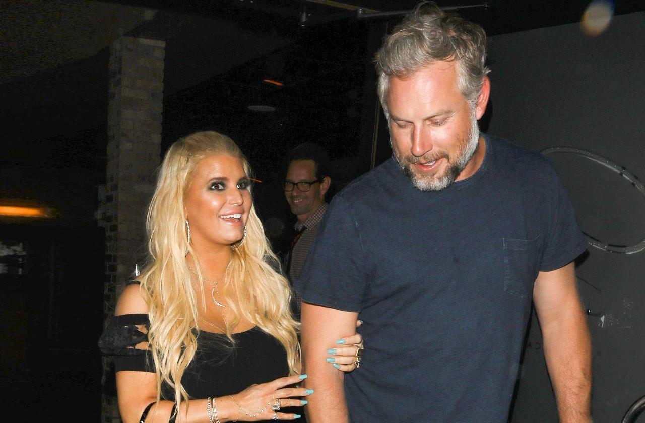 Jessica Simpson flashes bra at LAX with husband Eric Johnson