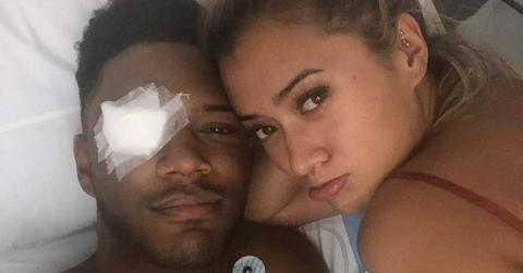 Theo Campbell Selfie In Hospital With Eye Patch with Woman laying Beside Him
