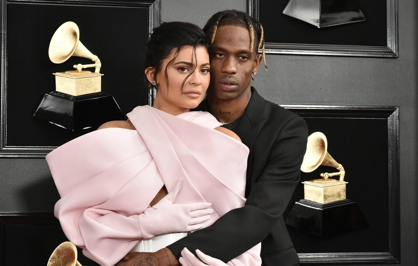 Dodged by cheating rumors, Travis Scott cancelled a concert and flew to Los Angeles to be with his baby mama, Kylie Jenner.