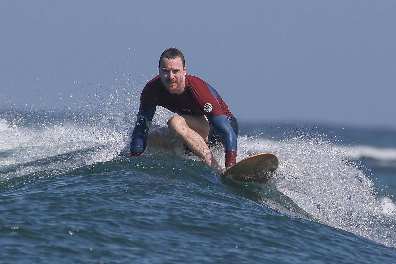 A Shirtless Michael Fassbender Shows Off Abs At The Beach