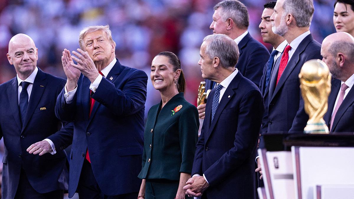 Trump was accused of lingering longer than wanted at the presentation.