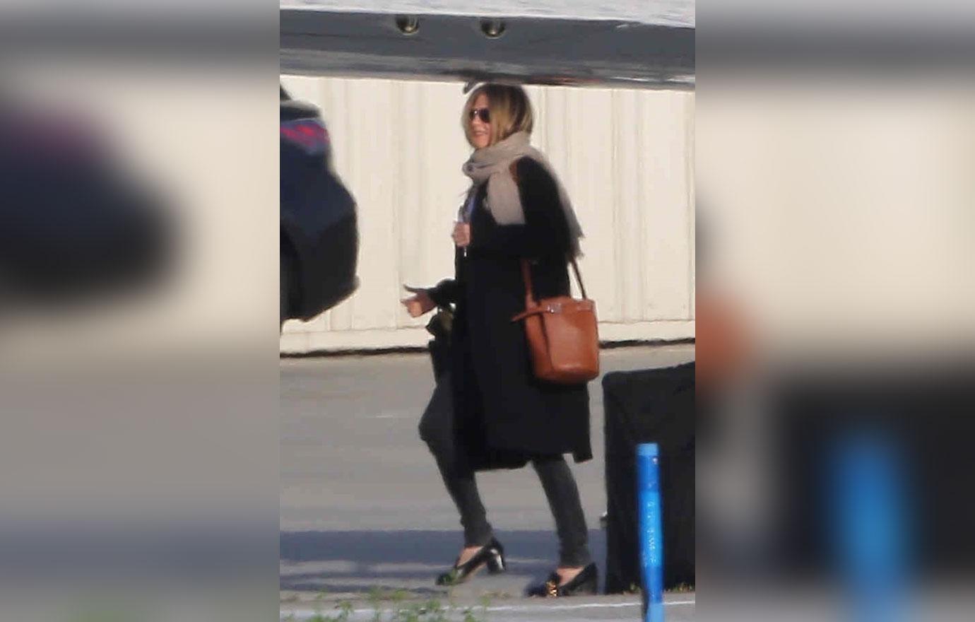 Jennifer Aniston Jets Away After Failing To Rekindle With Brad Pitt