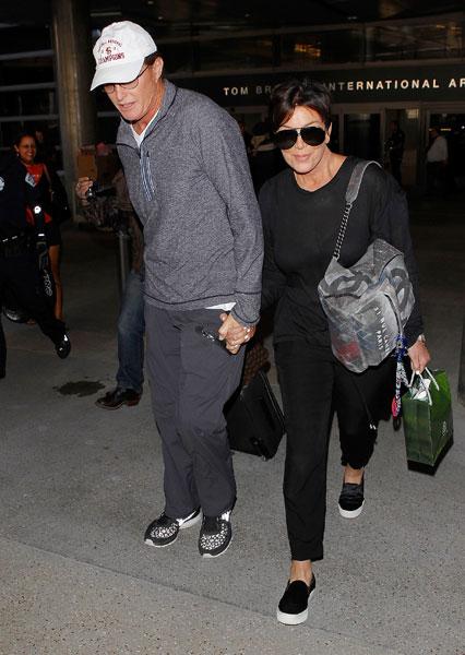 //kris and bruce jenner hold hands