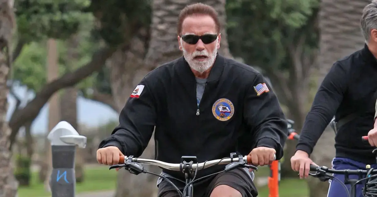 arnold schwarzenegger deines wrongdoing car crash lawsuit blames biker causing incident