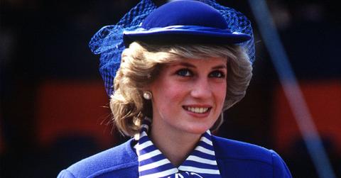 Smiling Princess Diana Wearing Rioyal Bllue Suit With Matching Hat and Blue And White STriped Blouse