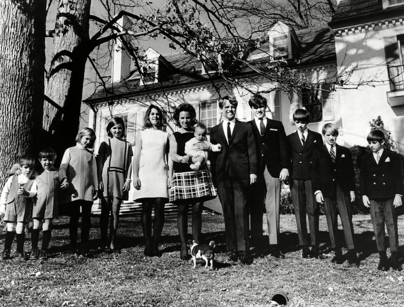 L-R: Matthew Maxwell Taylor Kennedy, Christopher George Kennedy, Mary Kerry Kennedy, Mary Courtney Kennedy, Kathleen Kennedy, Ethel Kennedy (holding Douglas Kennedy), Robert F. Kennedy, Joseph Patrick Kennedy, Robert F. Kennedy Jr., David Anthony Kennedy, Michael LeMoyne Kennedy, outside their home in Hickory Hill, Virginia, c. 1960s.