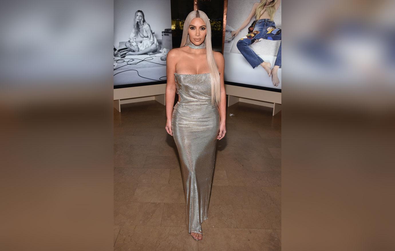 Kim Kardashian showcases her curves in silver leggings in NYC