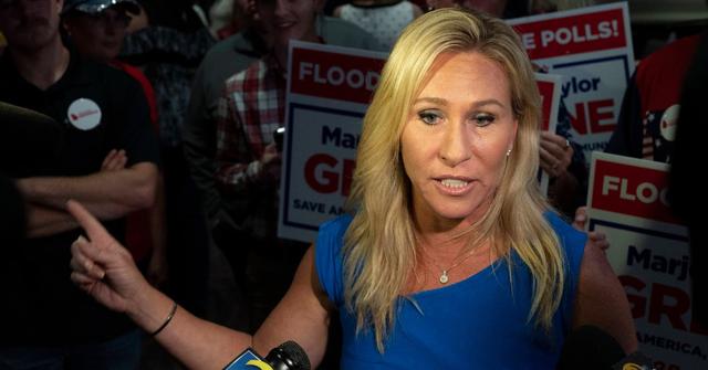 marjorie taylor green gun laws dispute british journalist pp