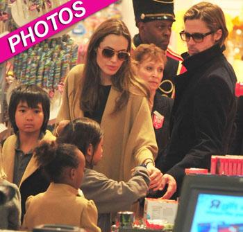 //angelina jolie brad pitt photos kids fao schwarz