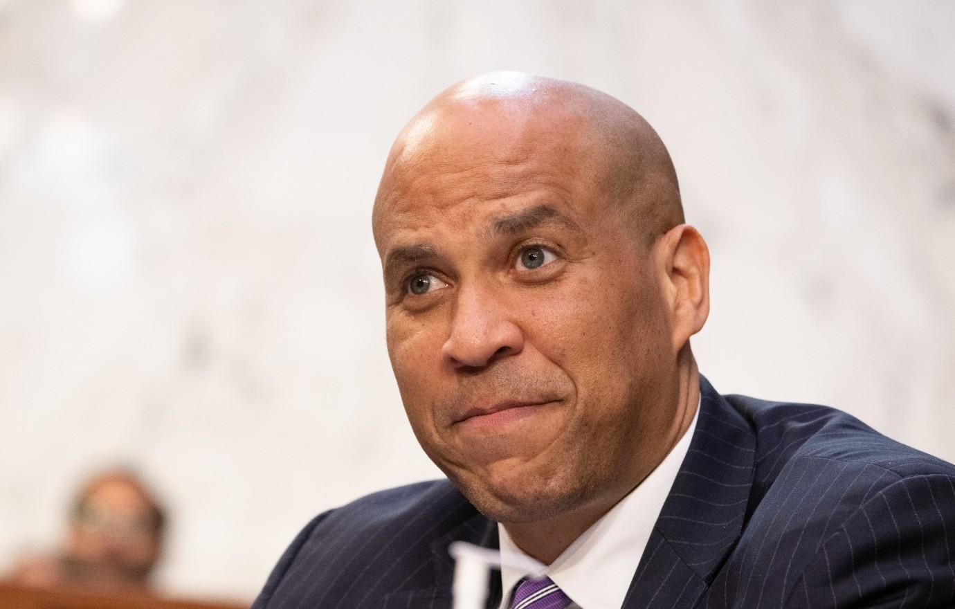 cory booker bonded elizabeth theranos almonds letter judge