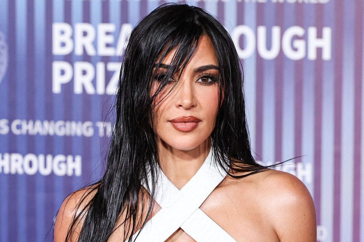 Kardashian is keeping West away from her new romance with Hamilton, citing concerns he could 'complicate everything.'