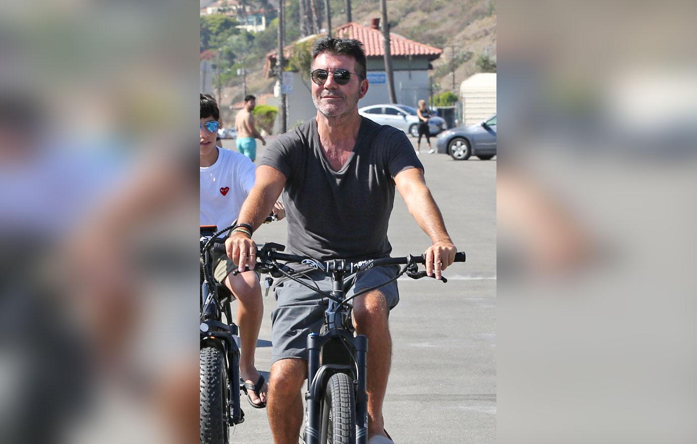 Simon Cowell Goes Bike Riding With His Family