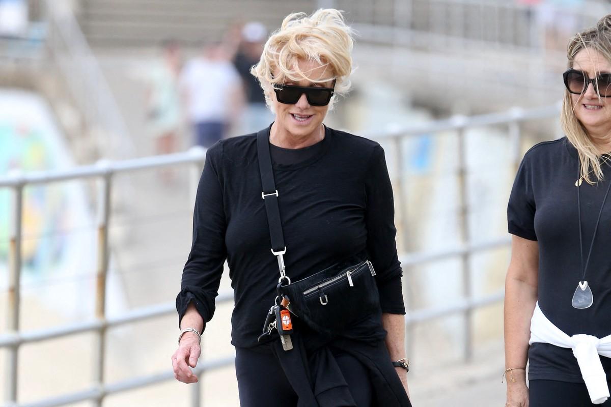 Deborra-Lee Furness cited 'betrayal' in divorce filing as Hugh Jackman's rumored link to Sutton Foster draws scrutiny.