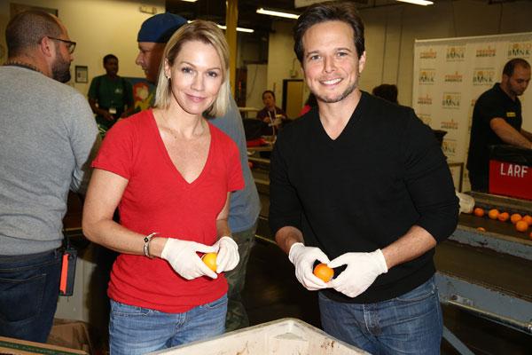 //Actors Jennie Garth and Scott Wolfattend the Hope For The Holidays feeding America celebrity event at Los Angeles Regional Foodbank on December   in Los Angeles California