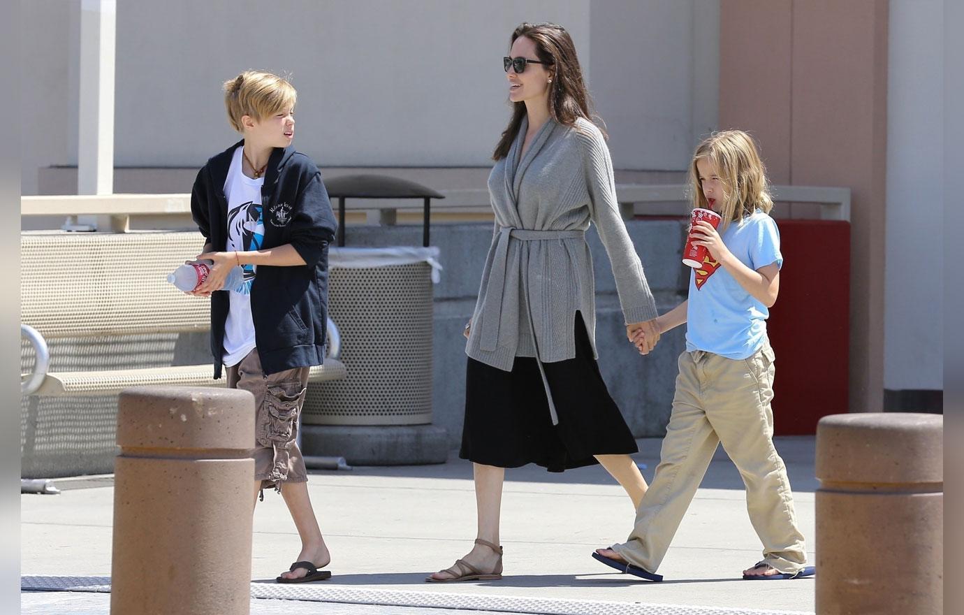 Angelina Jolie Takes Daughters Shiloh and Vivienne Shopping At Target