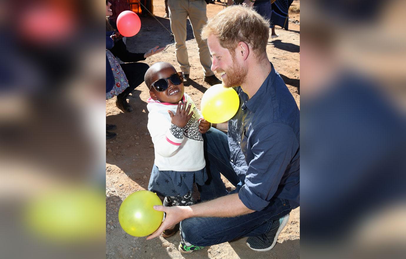 Prince Harry Plays With Children