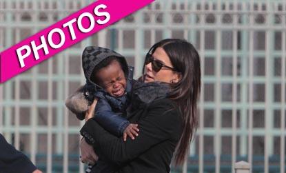 //sandra bullock louis crying photos inf