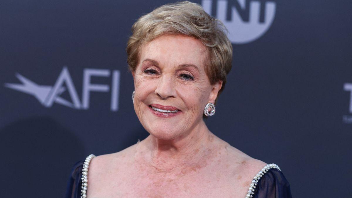 Julie Andrews revealed helicopter downdrafts repeatedly knocked her down while filming the opening of 'The Sound of Music.'