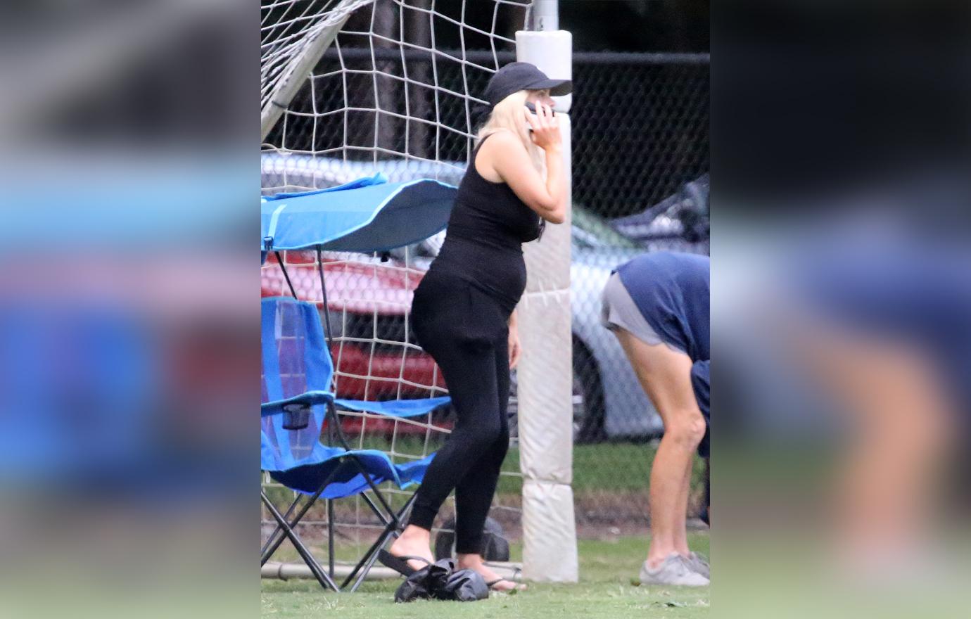 Elin Nordegren Wearing All Black With Pregnant Belly And Talking On The Phone at Her Son's Flag Football Game