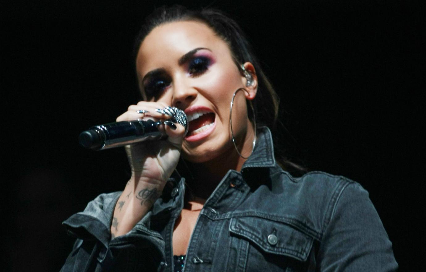 Demi Lovato performed live in a black jeans jacket.